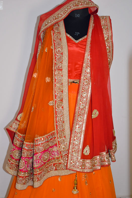 Vibrant Orange Embellished Lehenga Set